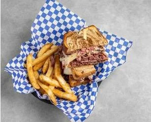 Pastrami reuben with fries at Bridge View Grill
